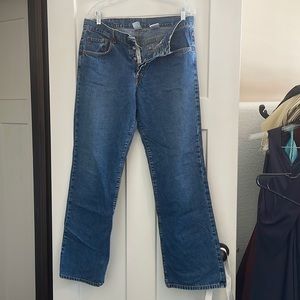 Womens Lucky Brand 5 pocket straight leg button fly jean in a medium blue color